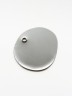 Light grey small circular disc