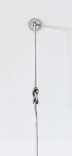 Closeup of wall mounted steel rod with a tied figure-eight knot on it